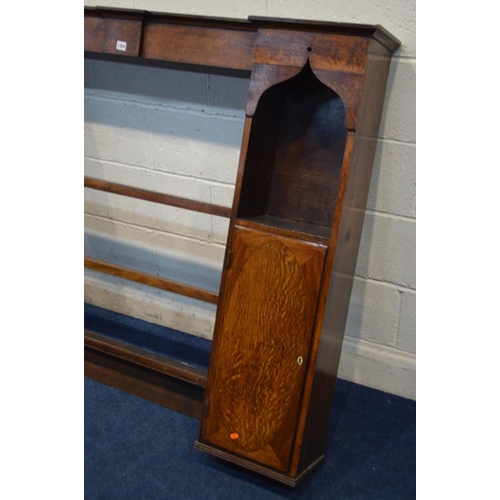 1324 - A GEORGIAN OAK DRESSER TOP, the twin uprights with an arched top above single cupboards flanking thr... 