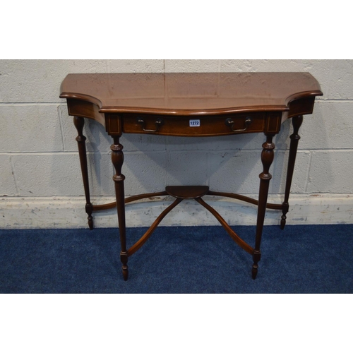 1327 - A REPRODUCTION MAHOGANY AND STRUNG SEPENTINE HALL TABLE, with concave front corners, single frieze d... 