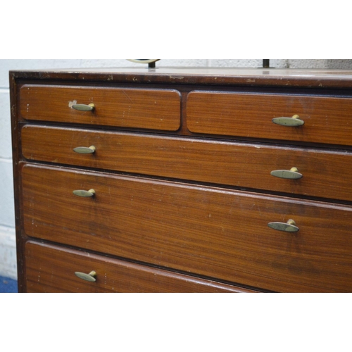 1328 - A 1950/60'S TEAK DRESSING CHEST, with triple mirrors, four graduating drawers flanked by a single cu... 