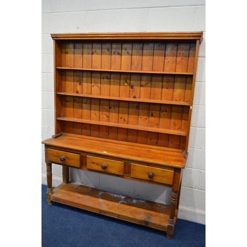 1336 - A DISTRESSED PITCH PINE DRESSER, with three drawers, width 154cm x depth 40cm x height 194cm