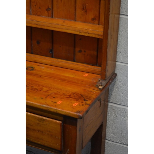 1336 - A DISTRESSED PITCH PINE DRESSER, with three drawers, width 154cm x depth 40cm x height 194cm