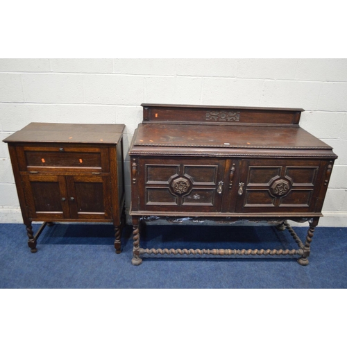 1337 - A DISTRESSED EARLY 20TH CENTURY OAK SIDEBOARD, with a raised back, double geometric panelled doors, ... 