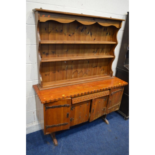 1339 - A DARK OAK DRESSER together with a rustic golden oak sideboard and a pine hanging plate rack (distre... 