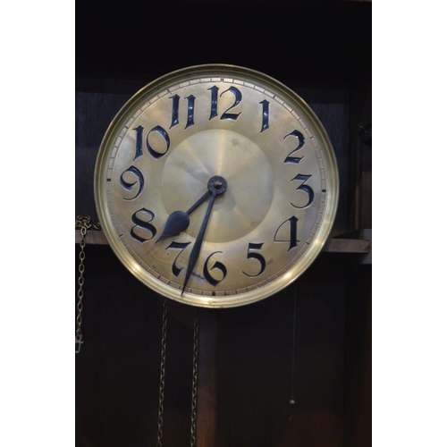 1357 - AN EARLY 20TH CENTURY OAK CASED LONG CASE CLOCK, with brassed dial with Arabic numerals (pendulum an... 