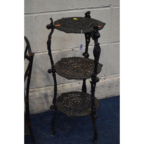 1365 - A BLACK CAST IRON THREE TIER STAND, together with a modern metal coat stand (2)