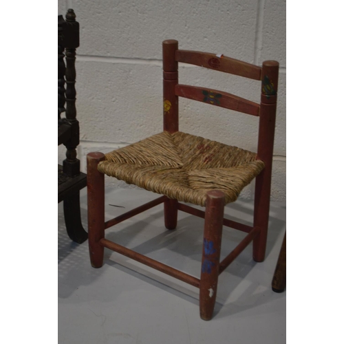 1366 - AN EARLY 20TH CENTURY OAK AND BEECH SPINDLE BACK CHILDS CHAIR, together with two other child's chair... 