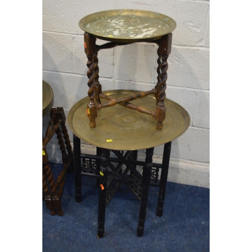 1380 - FOUR VARIOUS FOLDING BRASS TOPPED OCCASIONAL TABLES, and another folding table base (5)