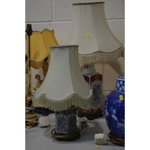 1384 - A QUANTITY OF ORIENTAL TABLE LAMPS, to include seven various resin figural lamps, four various chino... 