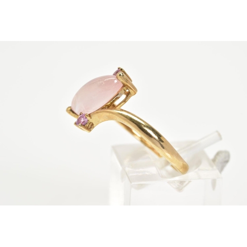 17 - A 9CT GOLD ROSE QUARTZ RING, the asymmetrical marquise rose quartz cabochon with a crossover design ... 