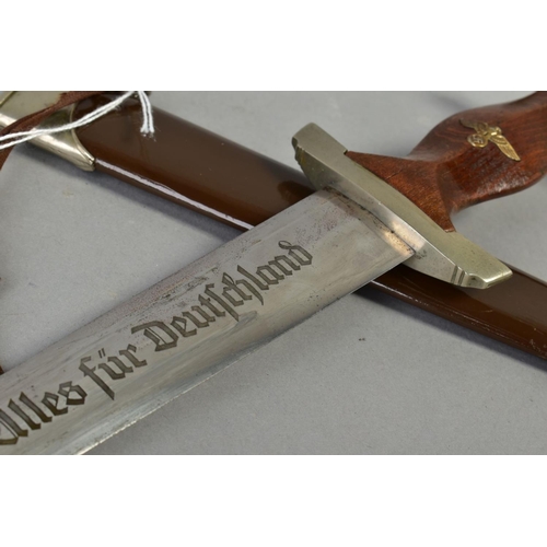 225 - A GERMAN FULL 'ERNST ROHM' S A DAGGER, which has received the 'lazy grind' treatment in that the nam... 