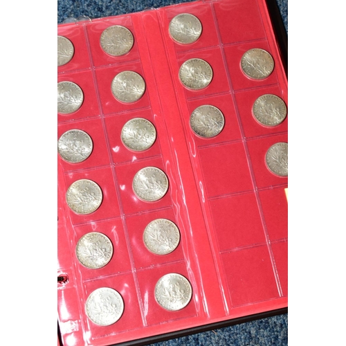 237 - TWO PLASTIC TUBS OF MAINLY FRENCH COINS, plus a banknote album, to include silver 100 Francs, 20 Fra... 