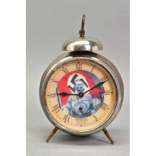 255 - A POSSIBLE LATE WAR GERMAN 'HITLER' PROPOGANDA TABLE CLOCK, with white metal body and legs, Roman nu... 