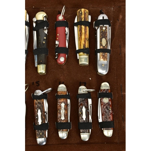 279 - A FOLD OVER CASE CONTAINING A COLLECTION OF PENKNIVES, all mounted and in good condition twenty four... 