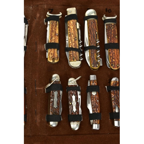 279 - A FOLD OVER CASE CONTAINING A COLLECTION OF PENKNIVES, all mounted and in good condition twenty four... 