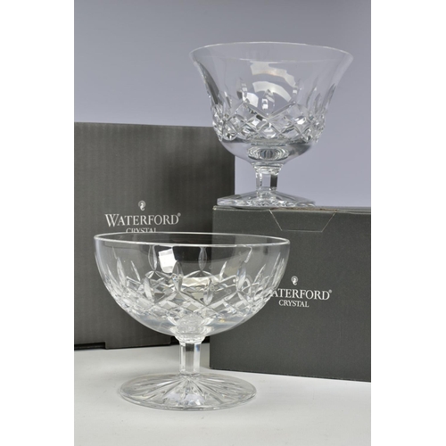 452 - TWO BOXED WATERFORD CRYSTAL LISMORE FOOTED BON BON DISHES, both stamped to base, heights 12cm x 11cm... 