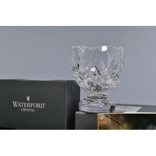 456 - A GROUP OF WATERFORD CRYSTAL, comprising boxed 'Celtic Cross', stamped to base, height 14cm, a boxed... 