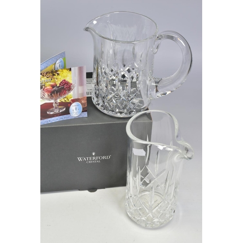 460 - TWO PIECES OF WATERFORD CRYSTAL LISMORE PATTERN, a water pitcher, height 16cm and a tall carafe (?),... 