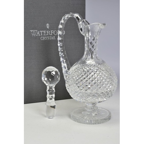 464 - A BOXED WATERFORD CRYSTAL ALANA CLARET JUG, stamped to base, height 31.5cm (crack to handle)