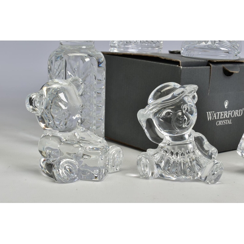 469 - A GROUP OF WATERFORD CRYSTAL NURSERY RELATED ITEMS, comprising a boxed 'Baby Boot' length 10cm, a sm... 