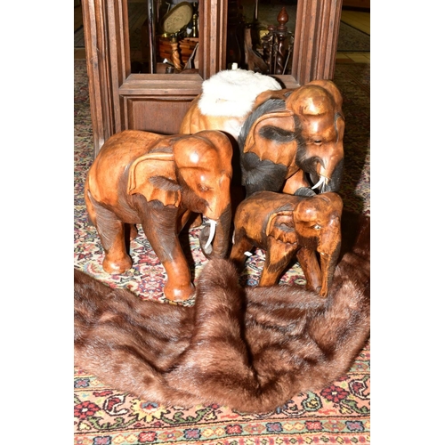 502 - THREE CARVED WOODEN AFRICAN ELEPHANTS OF GRADUATING SIZES, approximate tallest height 48cm, together... 