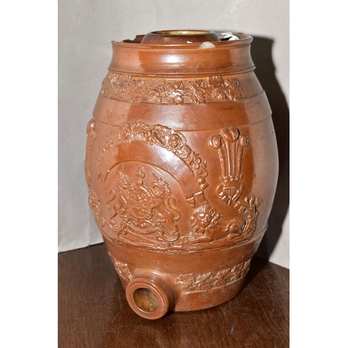 505 - A VICTORIAN STONEWARE BARREL applied decoration of Royal Arms, Lions, fruiting vine etc lacks cover,... 