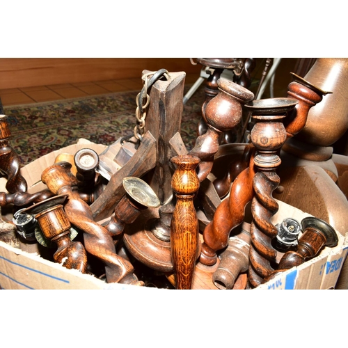 507 - FOUR BOXES OF CARVED WOODEN ITEMS to include oak candlesticks, Tazzas, ceiling lights, fireside comp... 