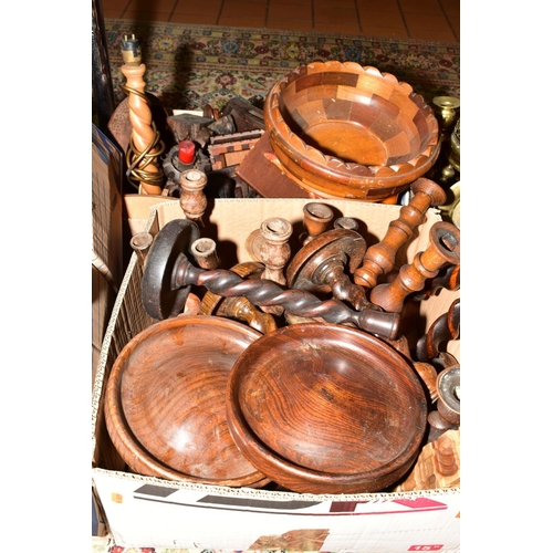 507 - FOUR BOXES OF CARVED WOODEN ITEMS to include oak candlesticks, Tazzas, ceiling lights, fireside comp... 