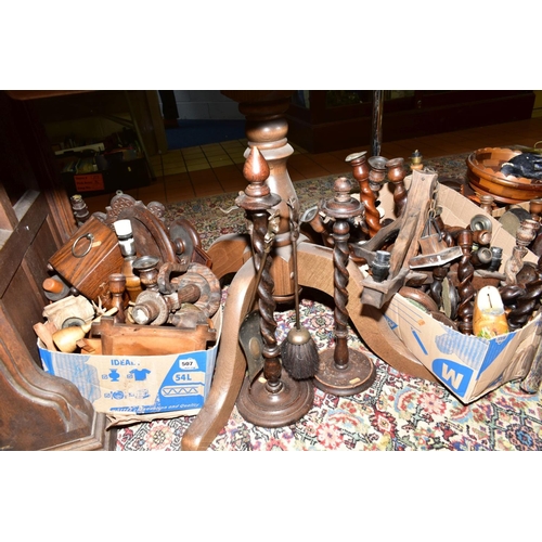 507 - FOUR BOXES OF CARVED WOODEN ITEMS to include oak candlesticks, Tazzas, ceiling lights, fireside comp... 