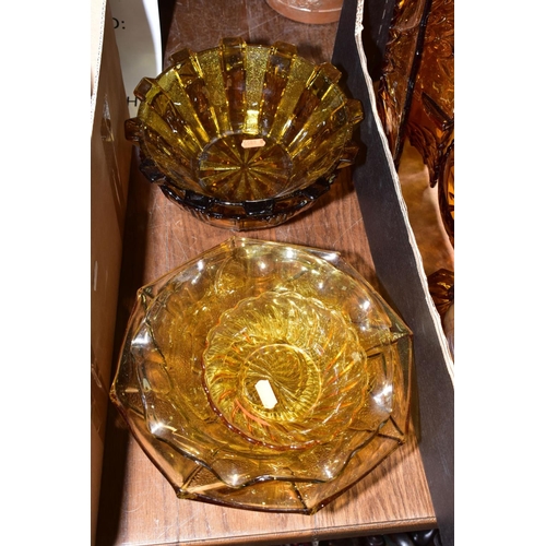 508 - THREE BOXES OF PRESS MOULDED AMBER GLASS to include bowls, storage containers, candlesticks, water j... 