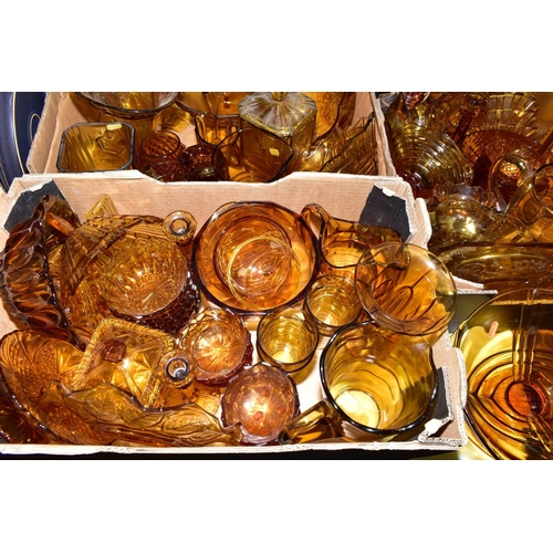 508 - THREE BOXES OF PRESS MOULDED AMBER GLASS to include bowls, storage containers, candlesticks, water j... 