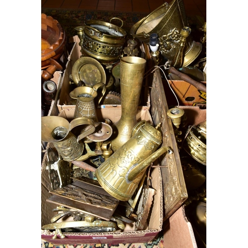 509 - FOUR BOXES OF BRASS WARES, to include candlesticks, lamp bases, trivets, jugs, bells, teapot, log ba... 