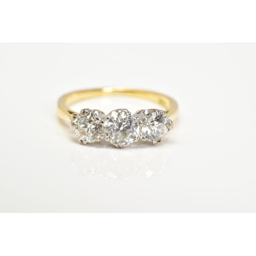 52 - A NEARLY TO MID 20TH CENTURY THREE STONE DIAMOND RING, three transitional cut diamonds, measuring fr... 