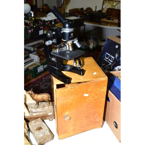 522 - A PZO WARSZAWA MICROSCOPE, model 1427, made in Poland, with wooden case and spare objective lens