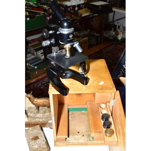 522 - A PZO WARSZAWA MICROSCOPE, model 1427, made in Poland, with wooden case and spare objective lens