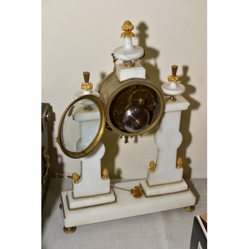 536 - A GILT AND MARBLE FRENCH CHIMING MANTLE CLOCK by A V Lacroix having Arabic numerals to a white ename... 