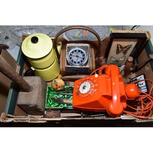 546 - A 1970'S FRENCH SOCOTEL 63 TELEPHONE in orange, with additional ear piece, body loose on chassis, no... 