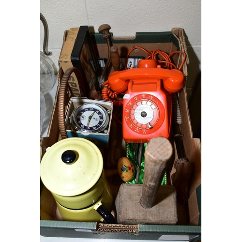 546 - A 1970'S FRENCH SOCOTEL 63 TELEPHONE in orange, with additional ear piece, body loose on chassis, no... 