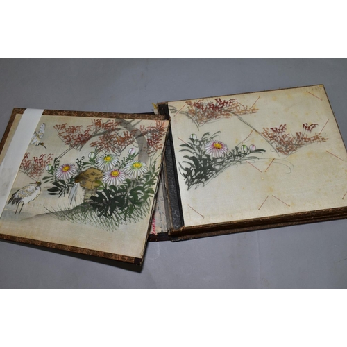 556 - A SHIBYAMA LAQUERED PHOTOGRAPH/POSTCARD ALBUM, containing 20 leaves of painted silk illustrations, t... 