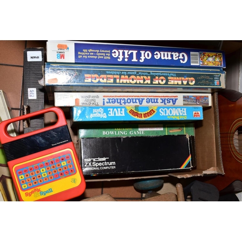 562 - AN ARIANA ACOUSTIC GUITAR, model No A572 with a quantity of boxed board games etc, to include unboxe... 