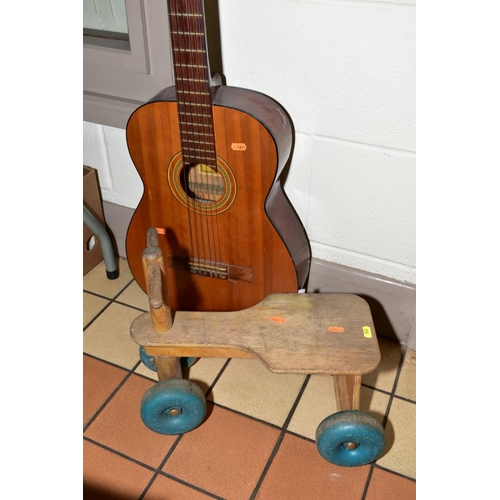 562 - AN ARIANA ACOUSTIC GUITAR, model No A572 with a quantity of boxed board games etc, to include unboxe... 