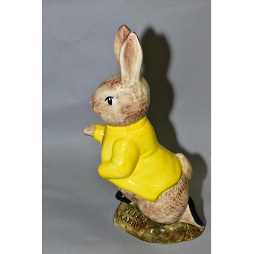 581 - A LARGE SYLVAC WARE POTTERY 'PETER RABBIT' FIGURE, with yellow jacket, named to front of base, print... 