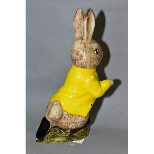 581 - A LARGE SYLVAC WARE POTTERY 'PETER RABBIT' FIGURE, with yellow jacket, named to front of base, print... 