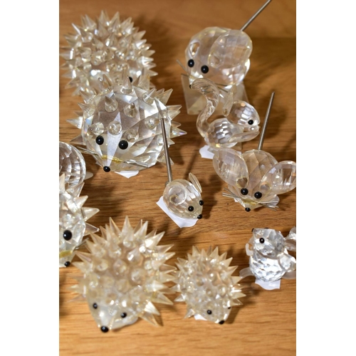 582 - A COLLECTION OF SWAROVSKI CRYSTAL ANIMALS AND BIRDS, including hedgehogs, mice, beavers, pigs, bee b... 