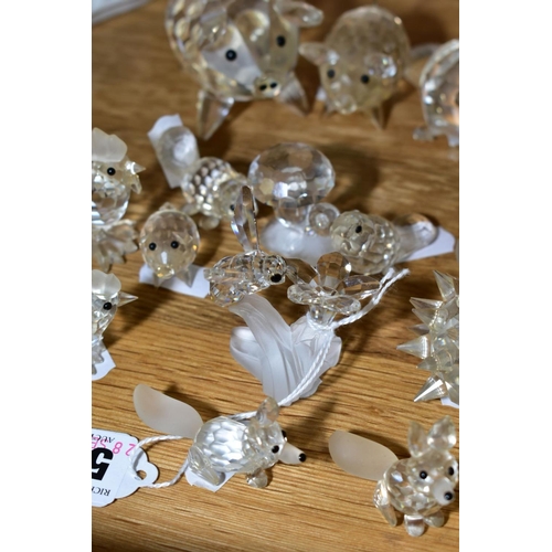 582 - A COLLECTION OF SWAROVSKI CRYSTAL ANIMALS AND BIRDS, including hedgehogs, mice, beavers, pigs, bee b... 