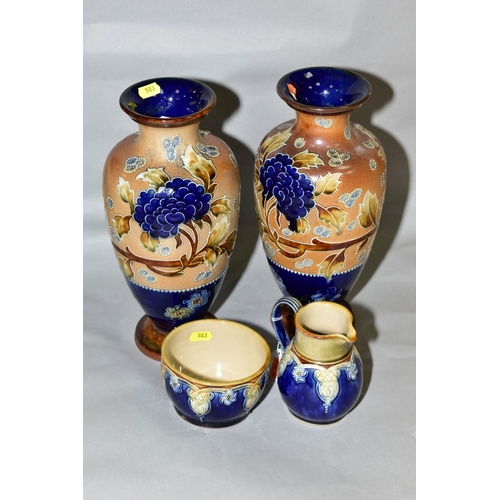 583 - A PAIR OF ROYAL DOULTON, DOULTON AND SLATTERS PATENT BALUSTER VASES, the buff textured ground tube l... 