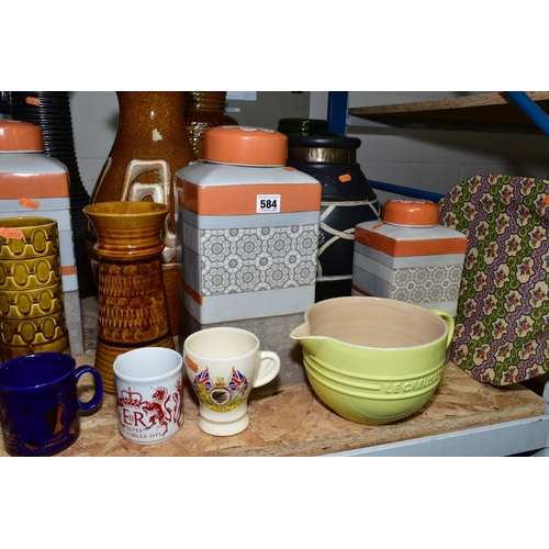 584 - A QUANTITY OF CERAMICS, etc, including a large yellow and peach glazed Le Creuset jug, diameter 18cm... 