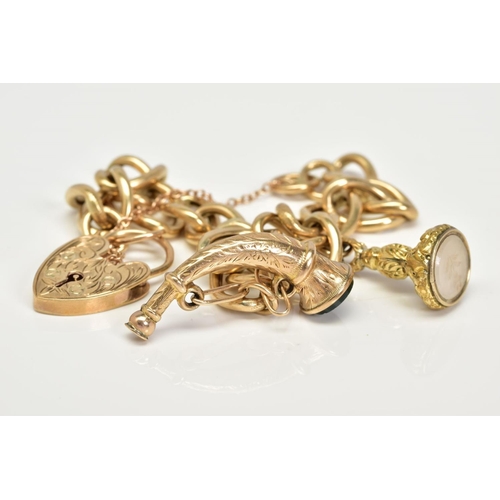 59 - A 9CT GOLD CHARM BRACELET, the charm bracelet which suspends two charms, the first a fob seal engrav... 