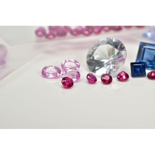 64 - A SELECTION OF LOOSE GEMSTONES, to include a 1.9ct circular cut colourless stone assessed as sapphir... 