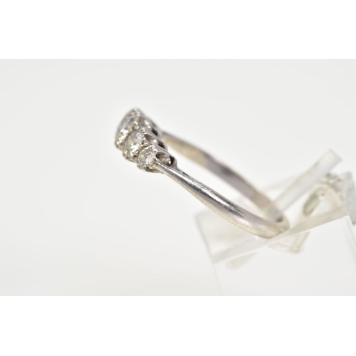 65 - A PLATINIUM FIVE STONE DIAMOND RING, designed with five claw set graduated old cut diamonds, tapered... 