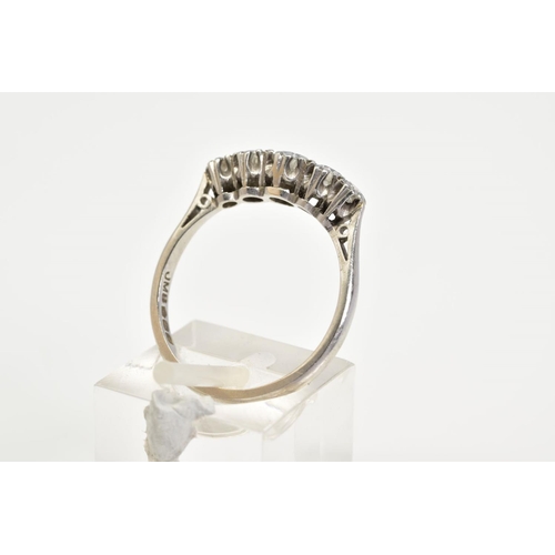 65 - A PLATINIUM FIVE STONE DIAMOND RING, designed with five claw set graduated old cut diamonds, tapered... 